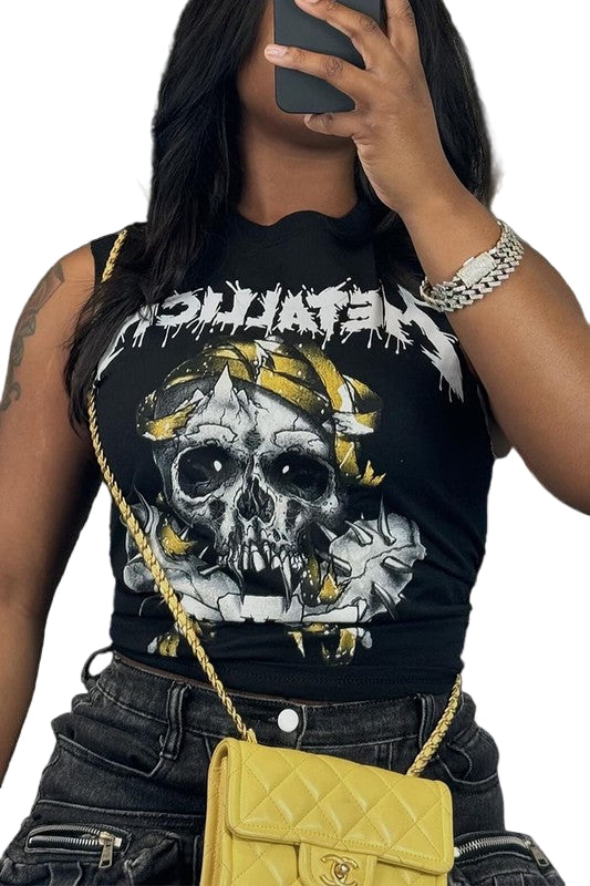 Person wearing a black tank top with a graphic design, holding a yellow handbag.